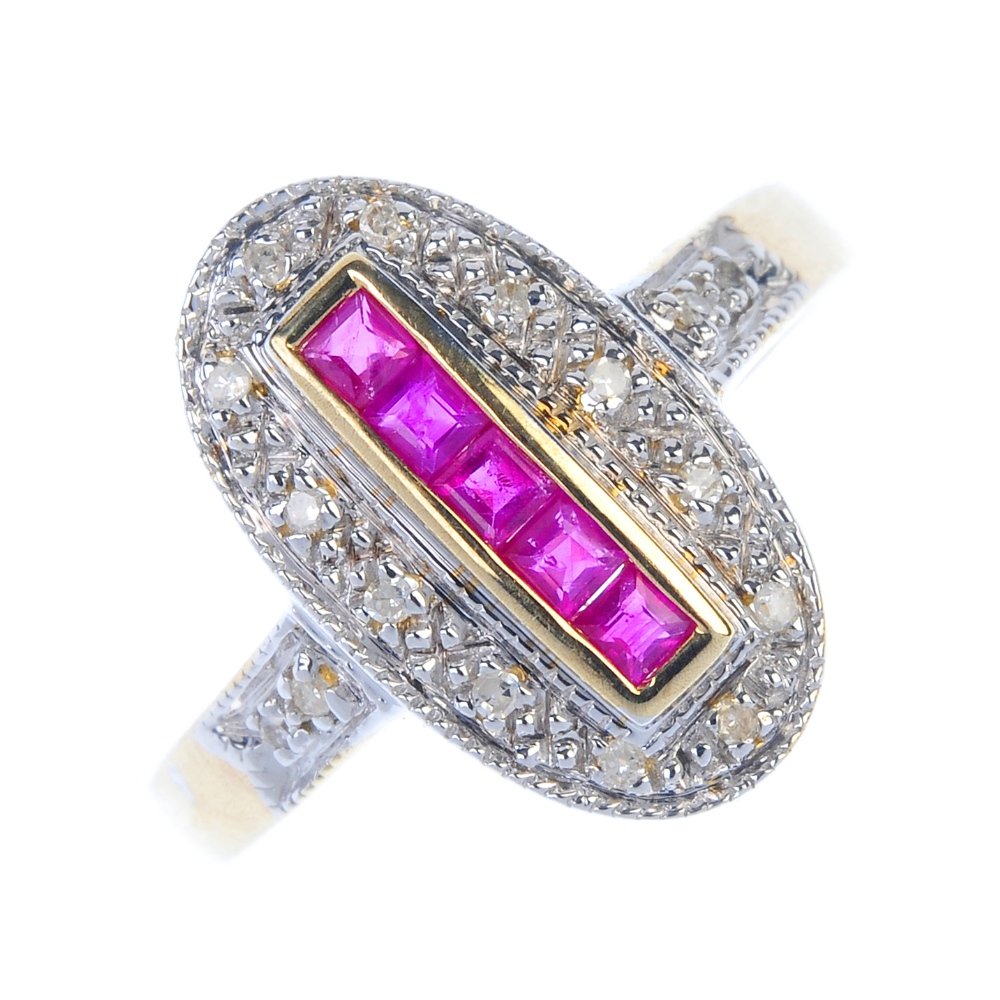 A 9ct gold ruby and diamond dress ring. (1 of 3)