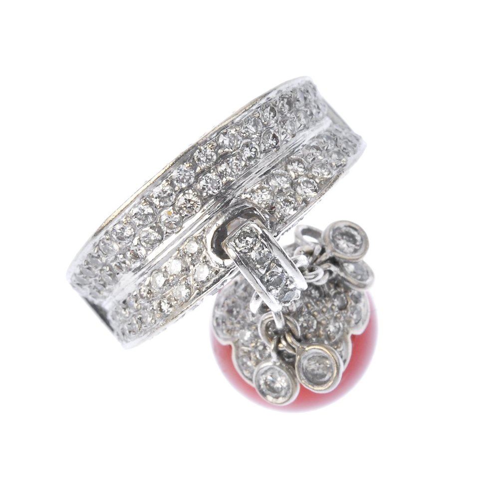 A diamond and coral dress ring. (1 of 3)