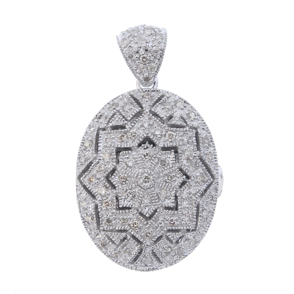A 14ct gold diamond locket. (1 of 2)