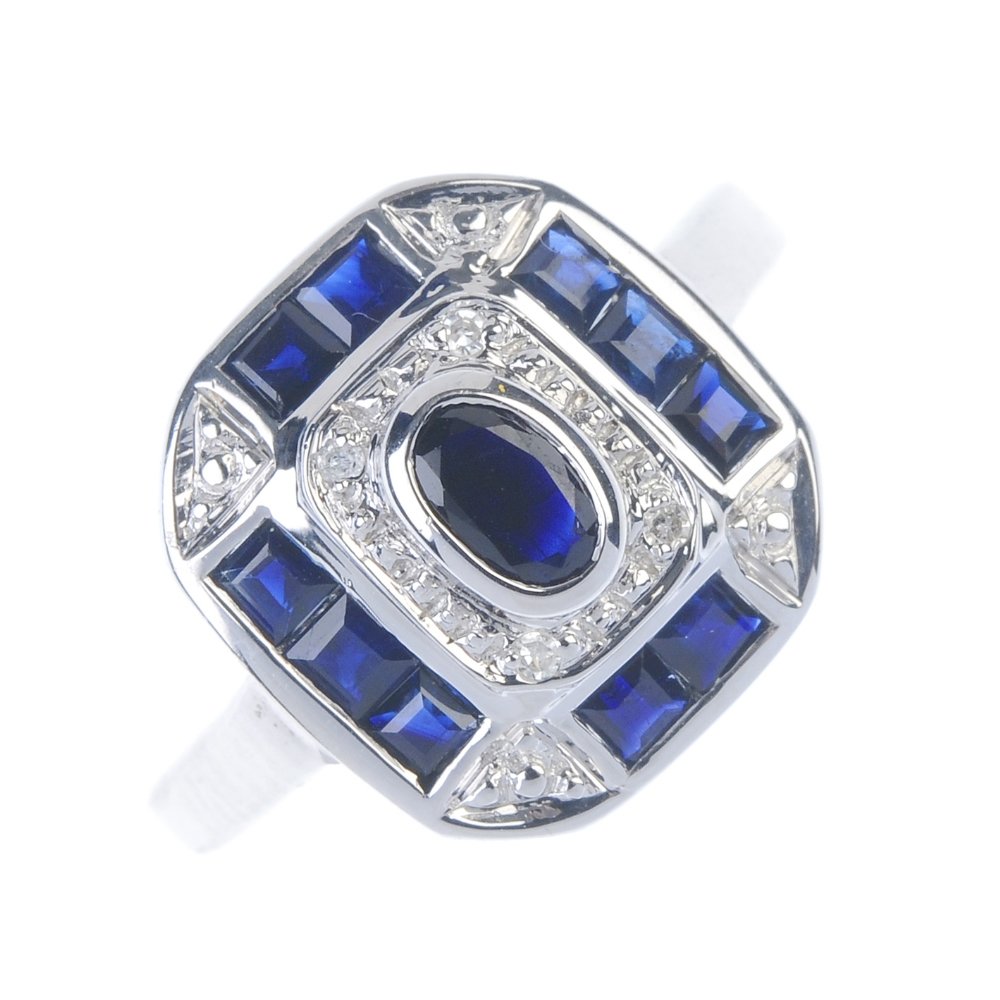 A 9ct gold sapphire and diamond dress ring. (1 of 3)