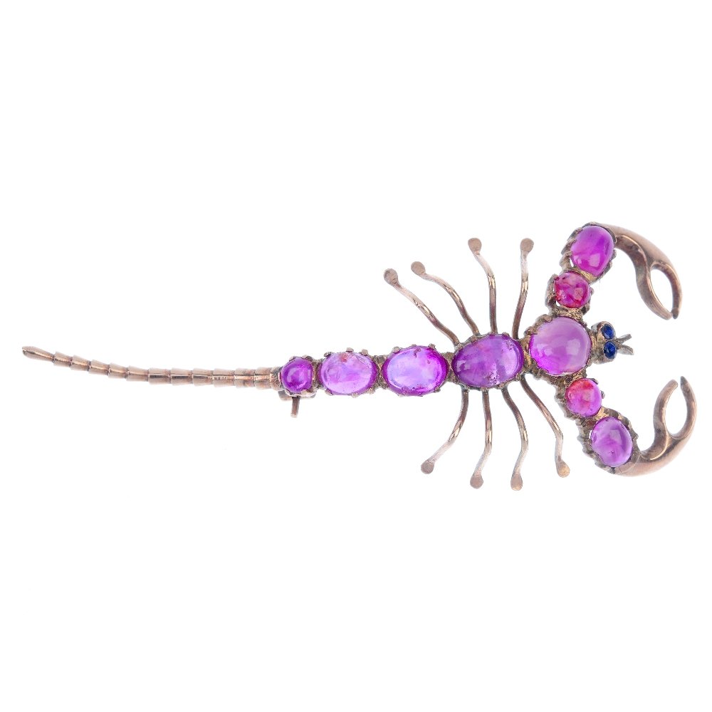 An early 20th century ruby scorpion brooch. (1 of 2)