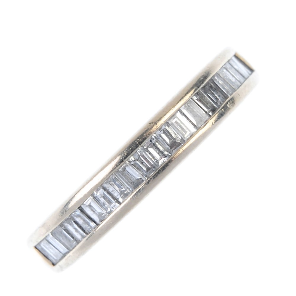 A diamond half-circle eternity ring. (1 of 3)