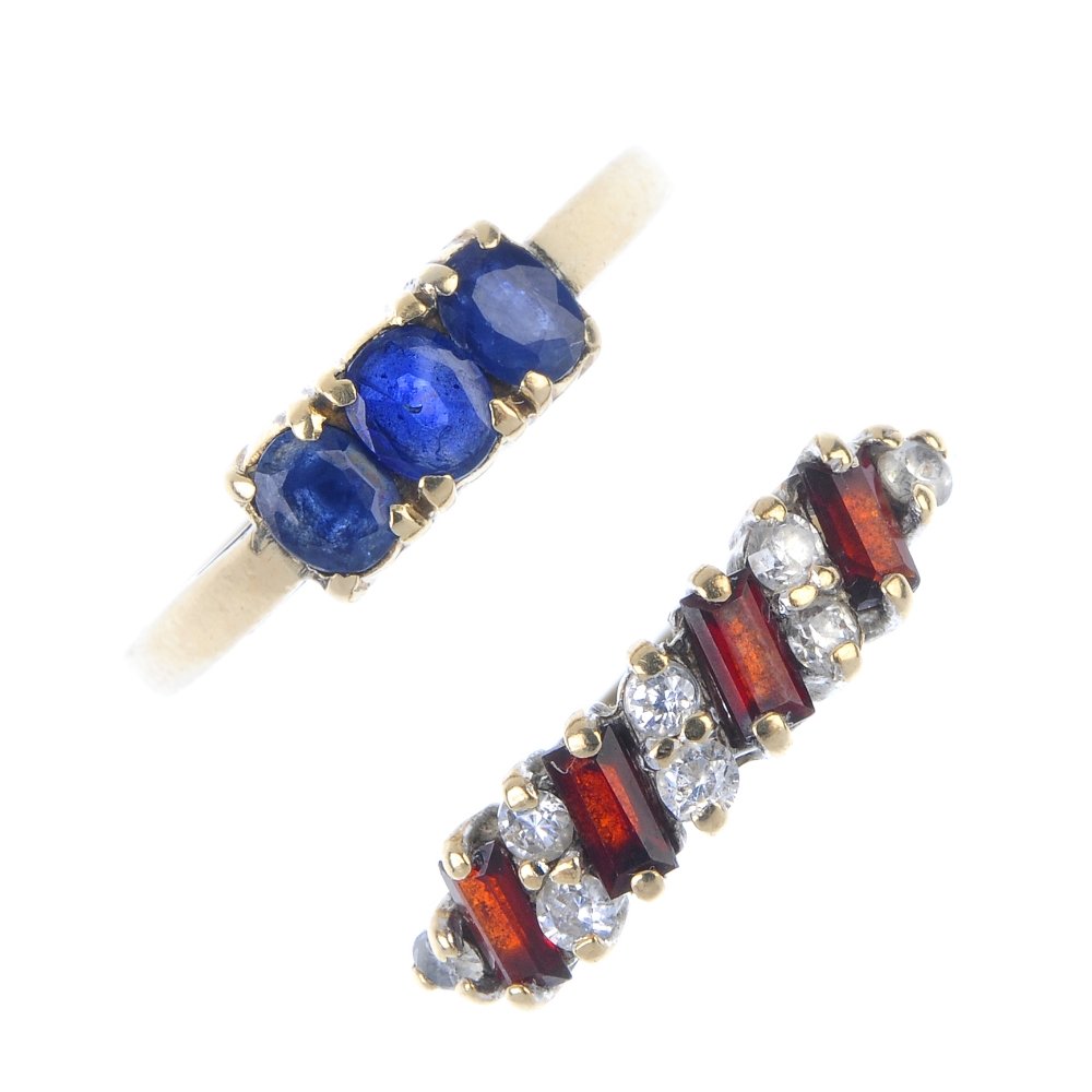 A selection of four gem-set dress rings. (1 of 3)