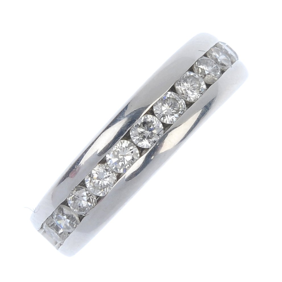 A diamond half-circle eternity ring. (1 of 3)