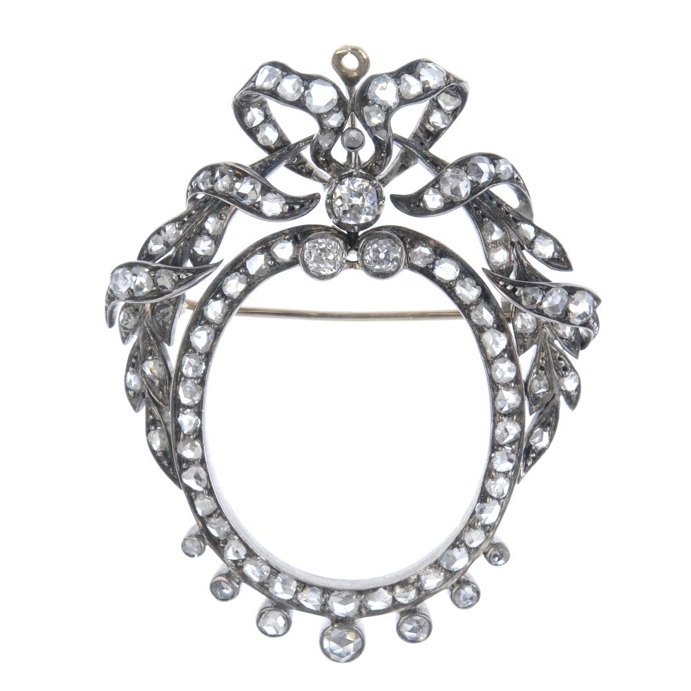 A mid 19th century silver and gold diamond pendant. (1 of 2)