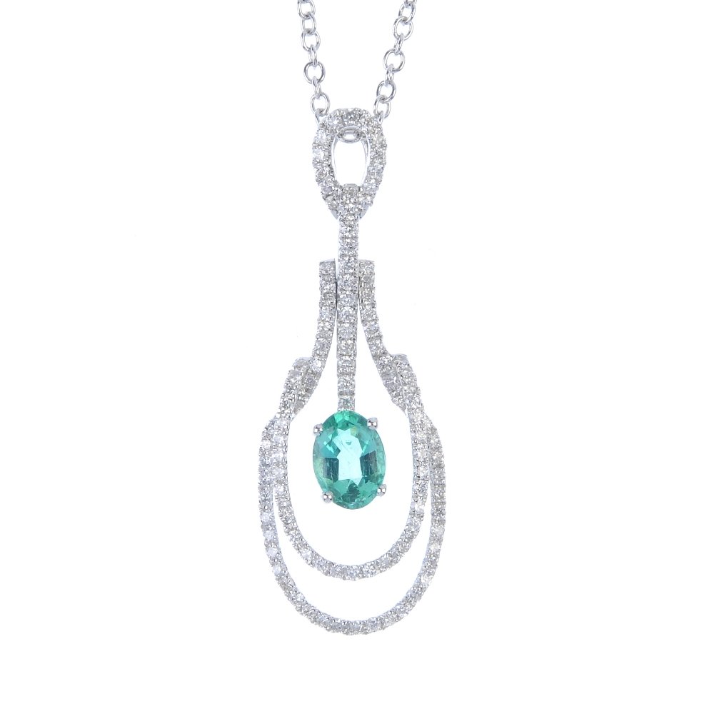 An emerald pendant, with chain. (1 of 2)