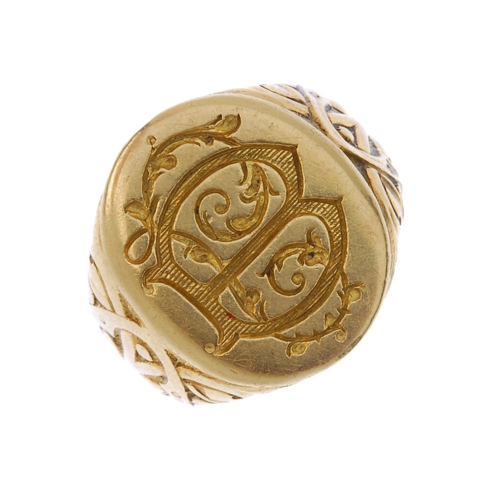 An early 20th century gold signet ring. (1 of 4)