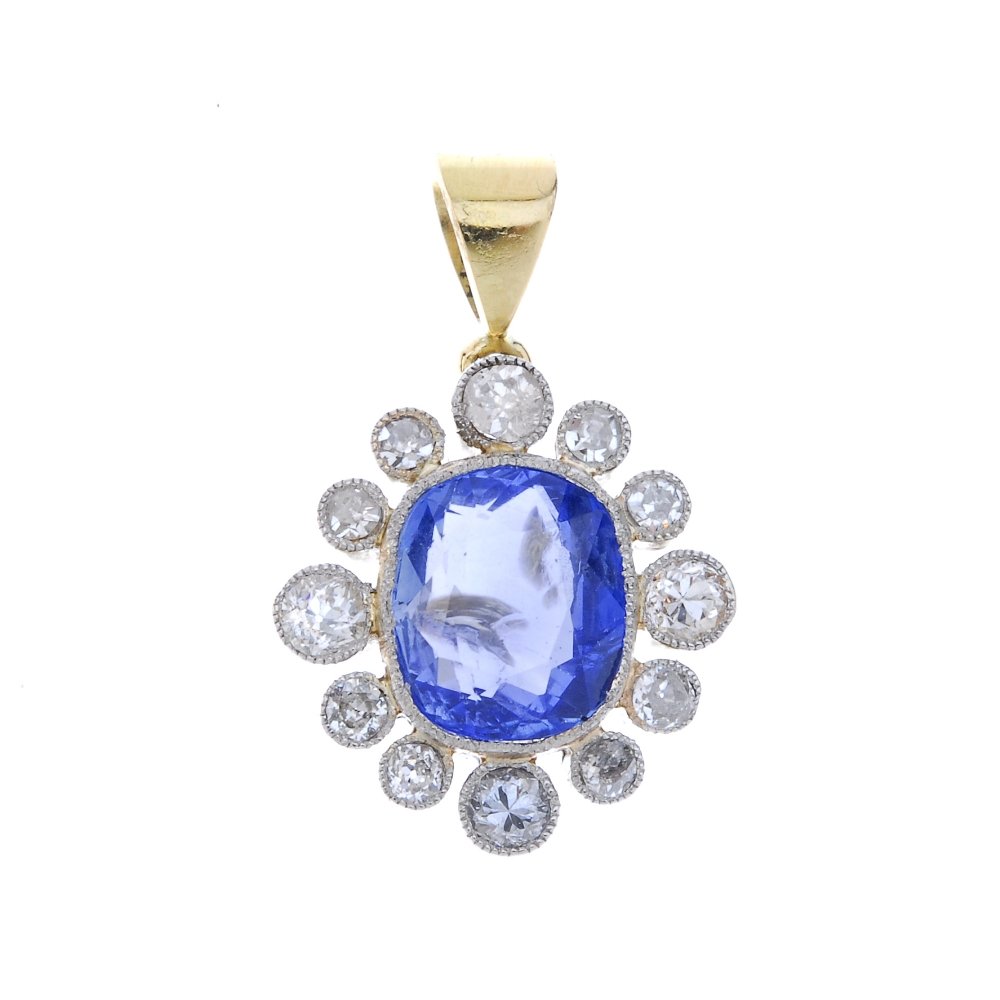 A sapphire and diamond pendant. (1 of 2)