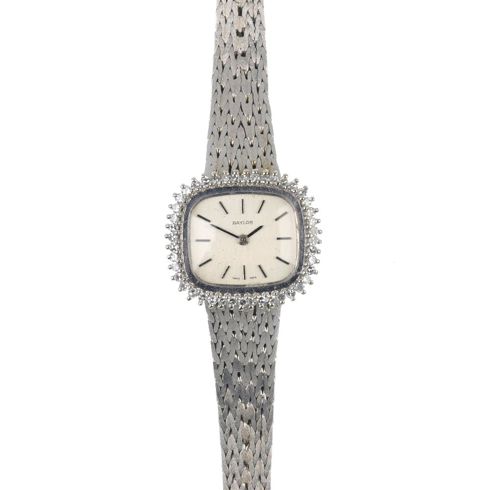 A lady's 9ct gold diamond dress watch. (1 of 3)