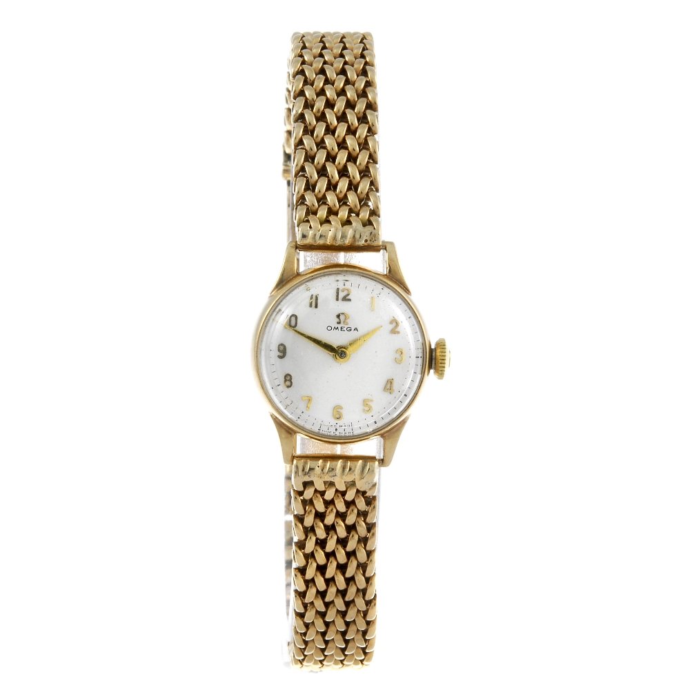 OMEGA - a lady's 9ct yellow gold bracelet watch.: OMEGA - a lady's bracelet watch. 9ct yellow gold case, hallmarked Birmingham 1959. Numbered 966956. Signed manual wind calibre 244. Silvered dial with Arabic numeral hour markers. Fitted to an unsigne