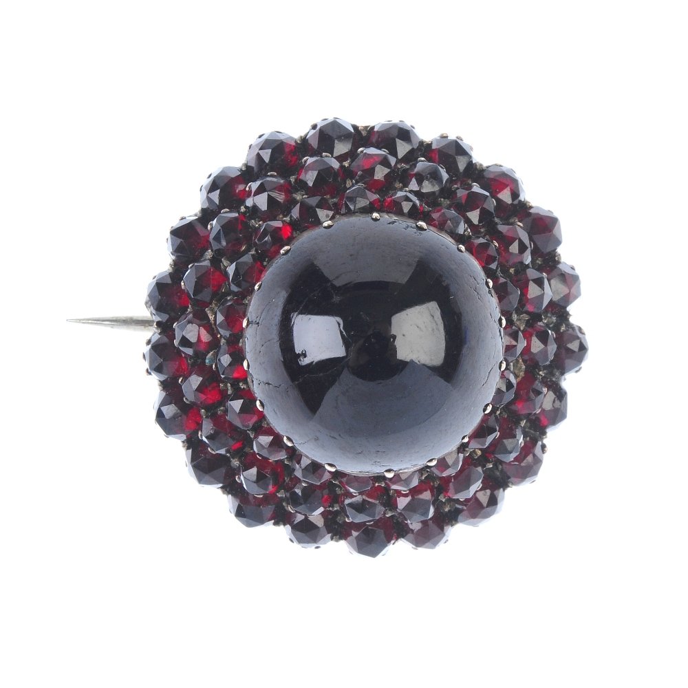 A late 19th century garnet and paste brooch. (1 of 2)
