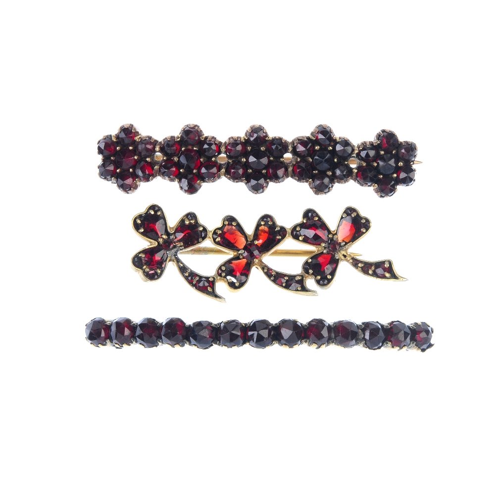 A selection of three garnet and red paste brooches. (1 of 2)