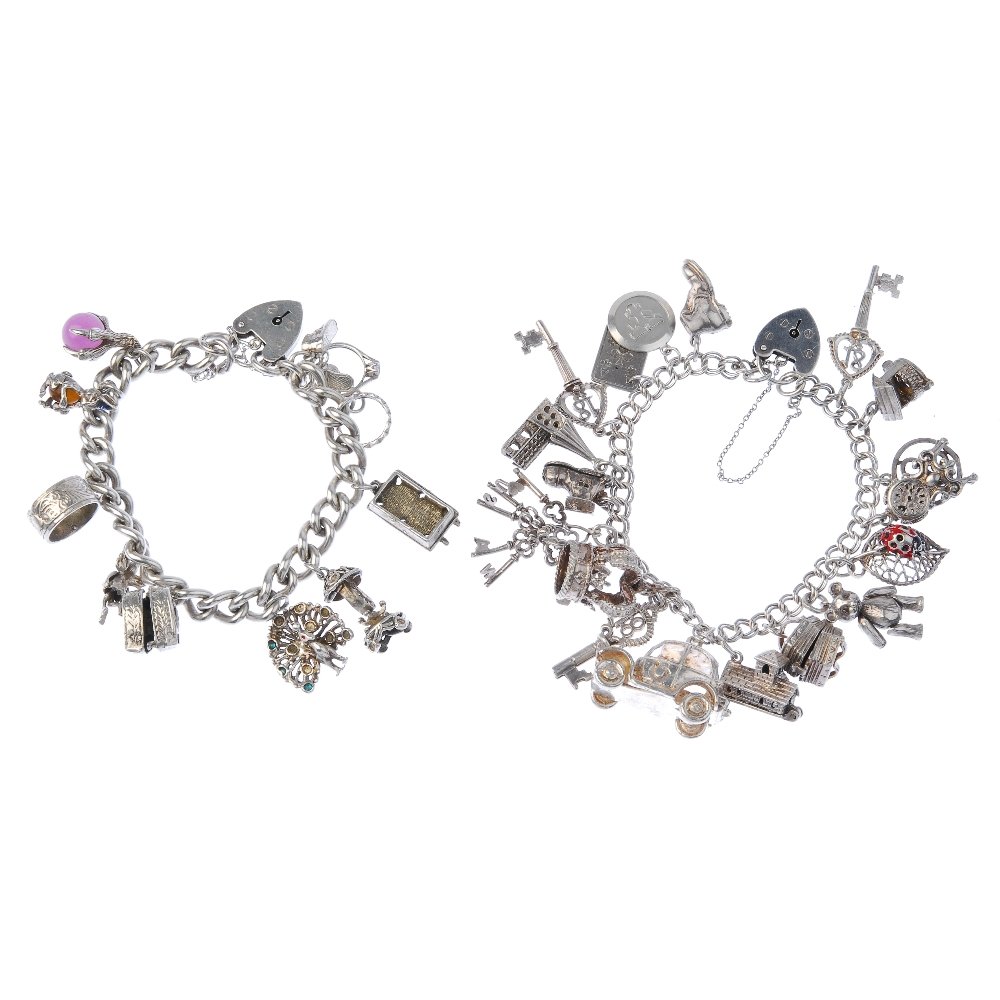Five charm bracelets and a selection of charms.: Five charm bracelets and a selection of charms. The five curb-link bracelets suspending a total of forty-nine charms including a wedding ring charm and a clock charm. Lengths 16 to 19cms. Weight 216.5