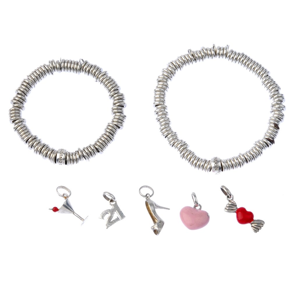 LINKS OF LONDON - a 'Sweetie' charm bracelet and five: LINKS OF LONDON - Two 'Sweetie' charm bracelets and five loose charms. The charms including a pink enamel heart and a martini glass with red enamel olive to the straw detail. With maker's marks. Inner