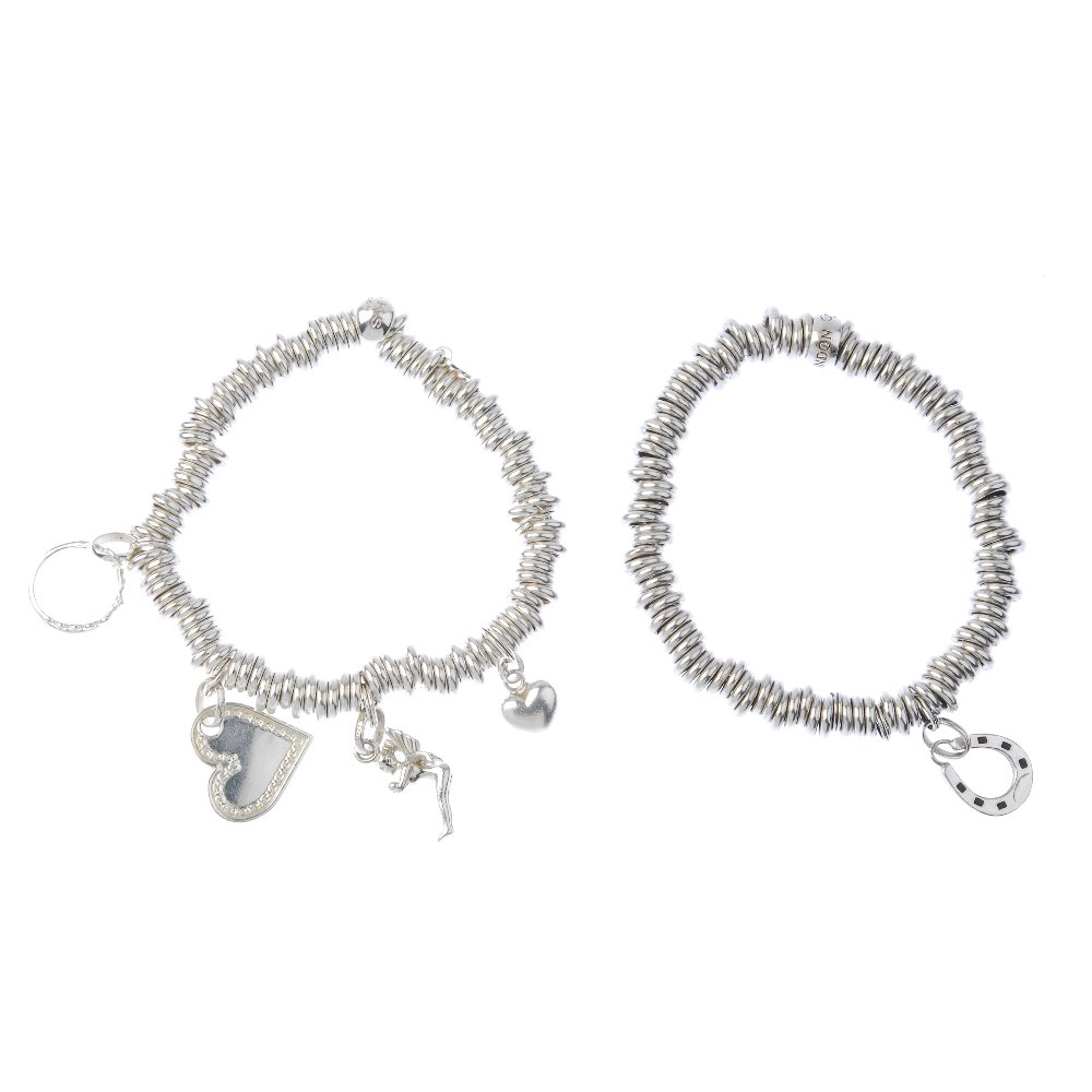 Five items of silver designer jewellery.: Five items of silver designer jewellery. To include two 'Sweetie' charm bracelets and a plain band ring by Links of London, a cross-over ring by Emporio Armani, and a fancy-link bracelet by Fiorelli.