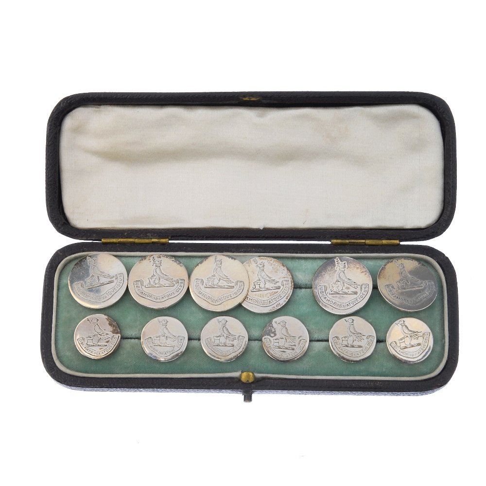 A set of twelve Edwardian silver buttons.: A set of twelve Edwardian silver buttons. Each of circular-shape, engraved to depict a bird, with motto reading "Ubi amor ibi atque deus" Hallmarks for Birmingham, 1904. Diameters 1.9 and 1.5cms. Weig