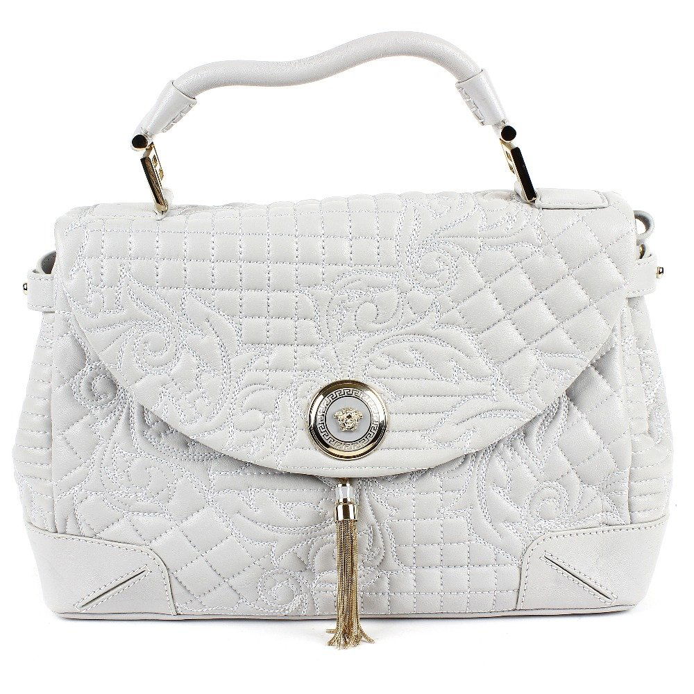 GIANNI VERSACE - an Altea Quilted Barocco Vanitas bag.: GIANNI VERSACE - an Altea Quilted Barocco Vanitas bag. Designed with a pale grey quilted leather exterior, single top handle, detachable shoulder strap, top flap closure featuring logo medallion and a