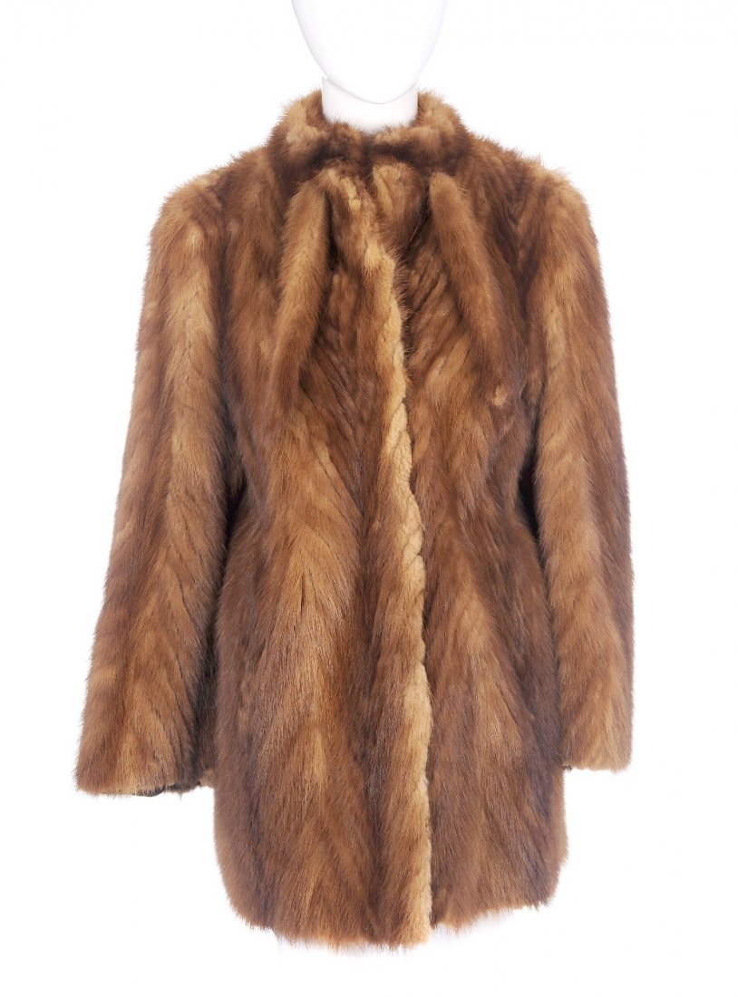 A three-quarter length pastel mink tail jacket. (1 of 2)