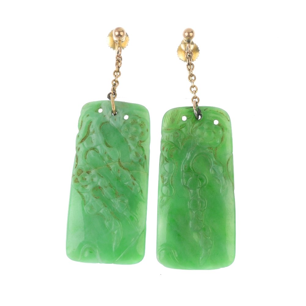 A pair of early 20th century jade ear pendants. (1 of 3)