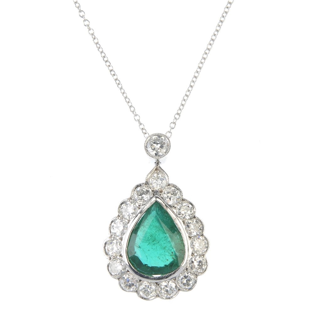 An emerald and diamond pendant. (1 of 3)