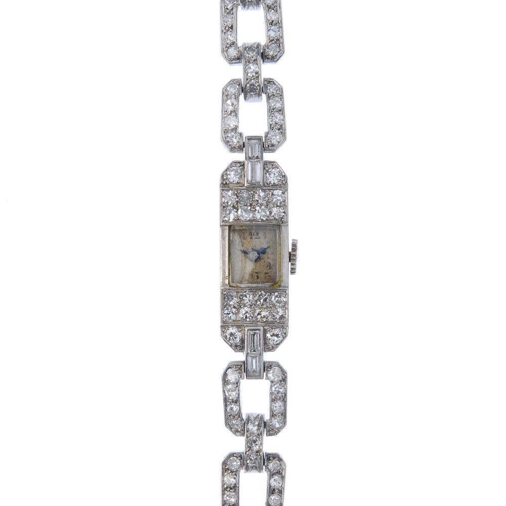 A mid 20th century platinum diamond cocktail watch. (1 of 4)