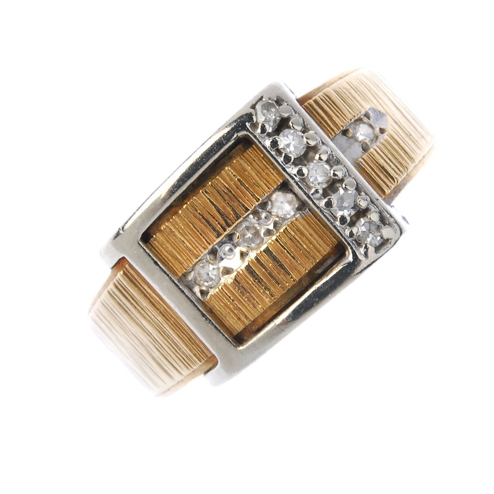 A mid 20th century gold diamond buckle ring. (1 of 3)