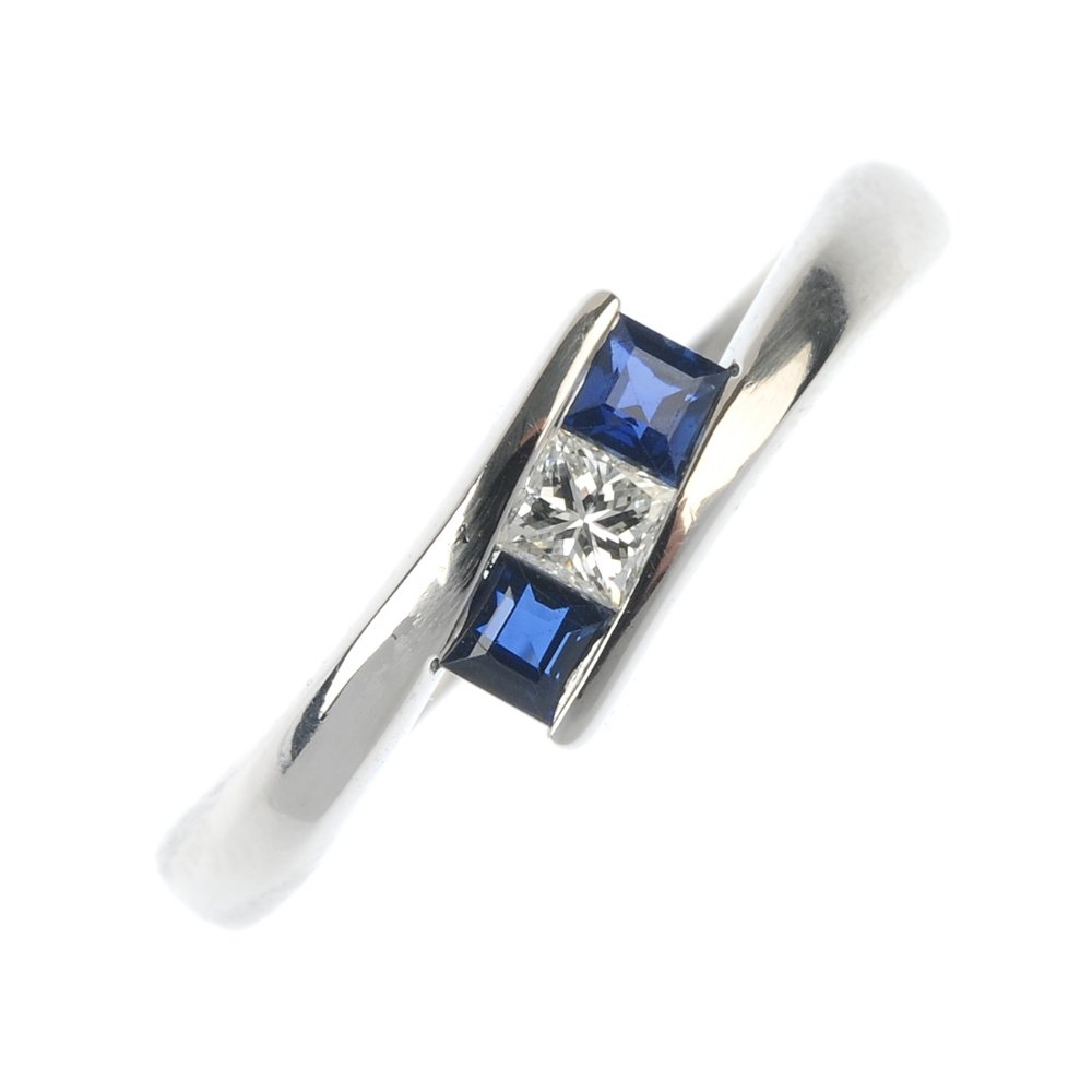 An 18ct gold sapphire and diamond ring. (1 of 3)