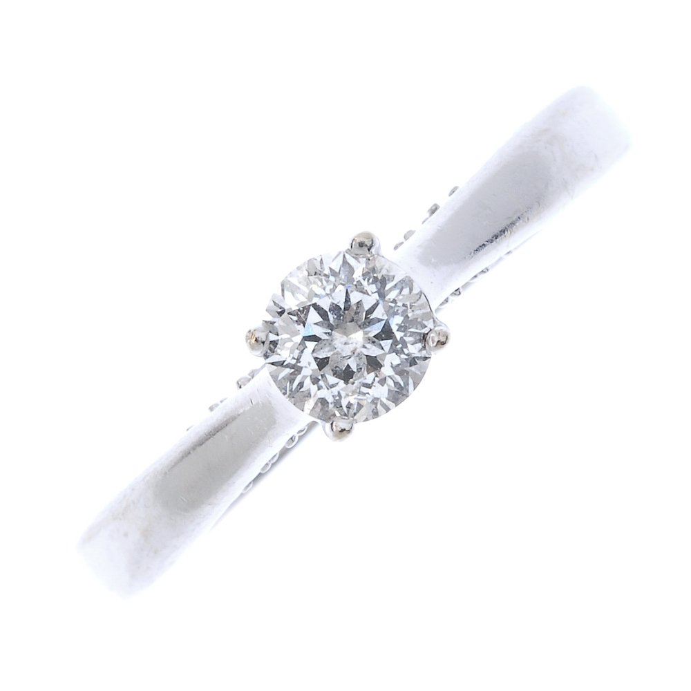 An 18ct gold diamond single-stone ring. (1 of 3)