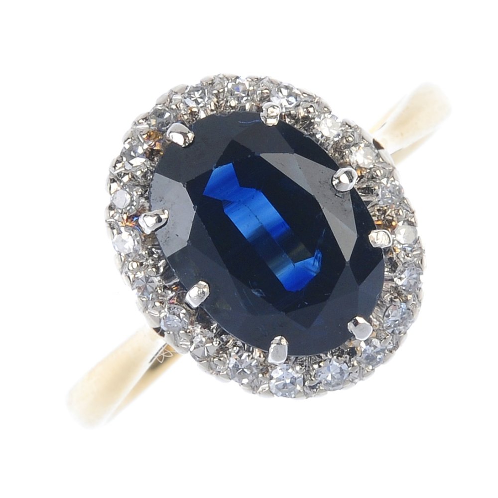 A sapphire and diamond cluster ring. The oval-shape (1 of 3)