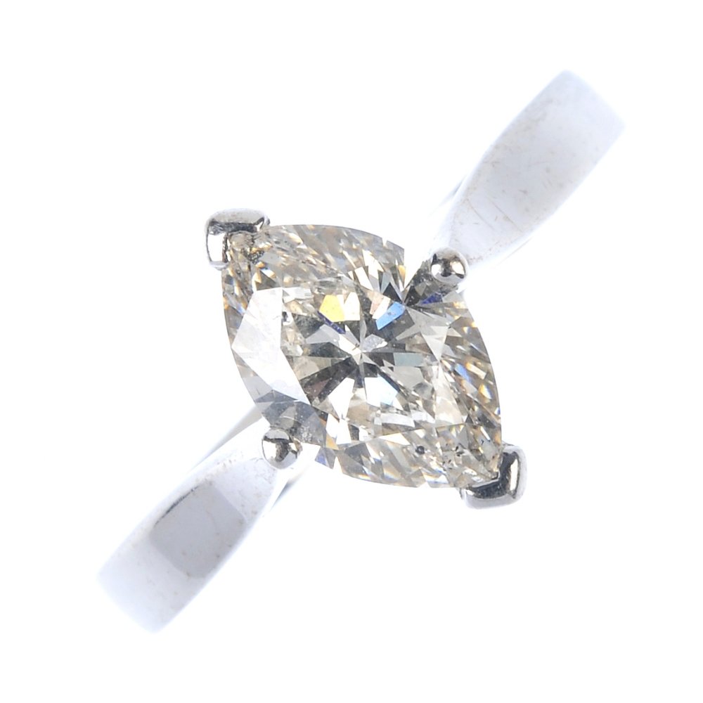 An 18ct gold diamond single-stone ring. The (1 of 3)