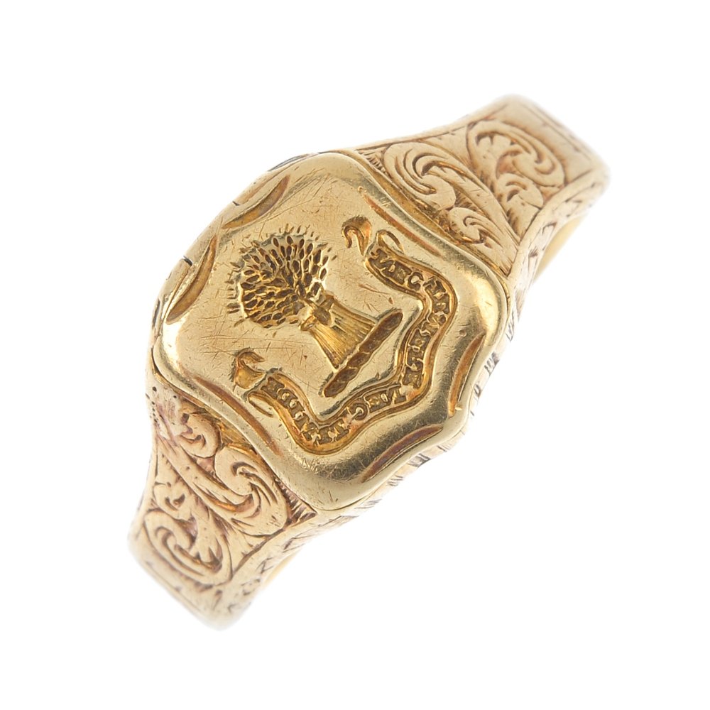 A mid Victorian 18ct gold signet ring. The scroll (1 of 4)