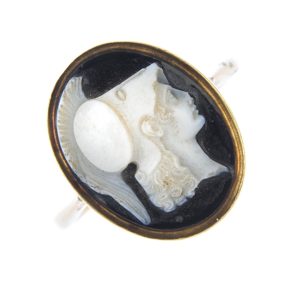 A cameo signet ring. The agate cameo, carved to depict (1 of 3)