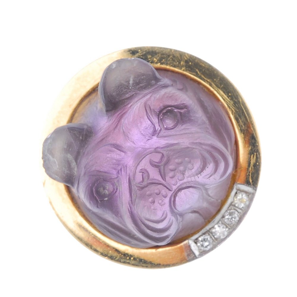 (185135) An amethyst and diamond novelty ring. Designed (1 of 5)