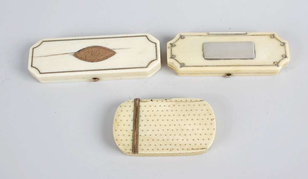 Three Georgian ivory toothpick cases, two of: Three Georgian ivory toothpick cases, two of rectangular shaped form, and each with inlaid metal decoration, together with a similar example or curved rectangular form, 3.5” (8.75cm) wide. (3).