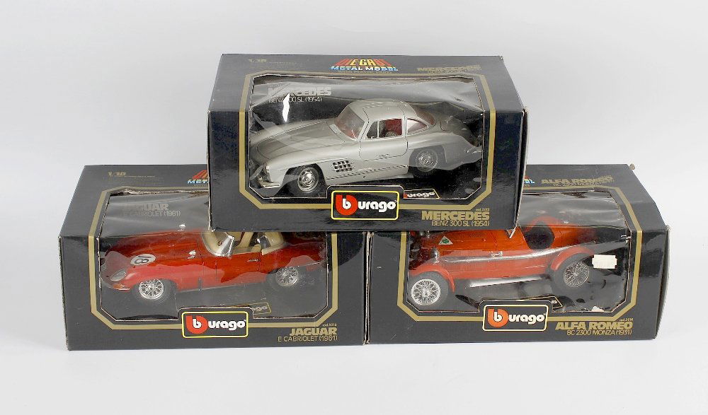 Three boxes containing six Burago 1.18 scale diecast: Three boxes containing six Burago 1.18 scale diecast and plastic model cars, each in original box, a Corgi classics AEC turntable fire engine New Zealand in original box, other boxed diecast model veh