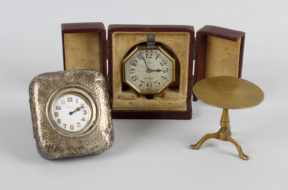A 1930's travel clock within octagonal shaped case, the: A 1930's travel clock within octagonal shaped case, the dial detailed Fairfax & Roberts Sydney & London, the case engraved verso To my darling godmother, a hallmarked silver fronted pocket watch case,