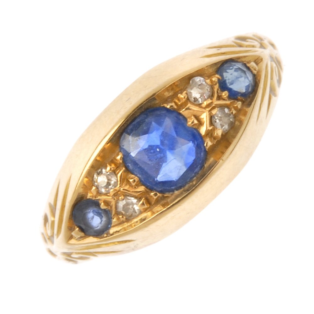 An Edwardian 18ct gold sapphire and diamond ring. The (1 of 3)