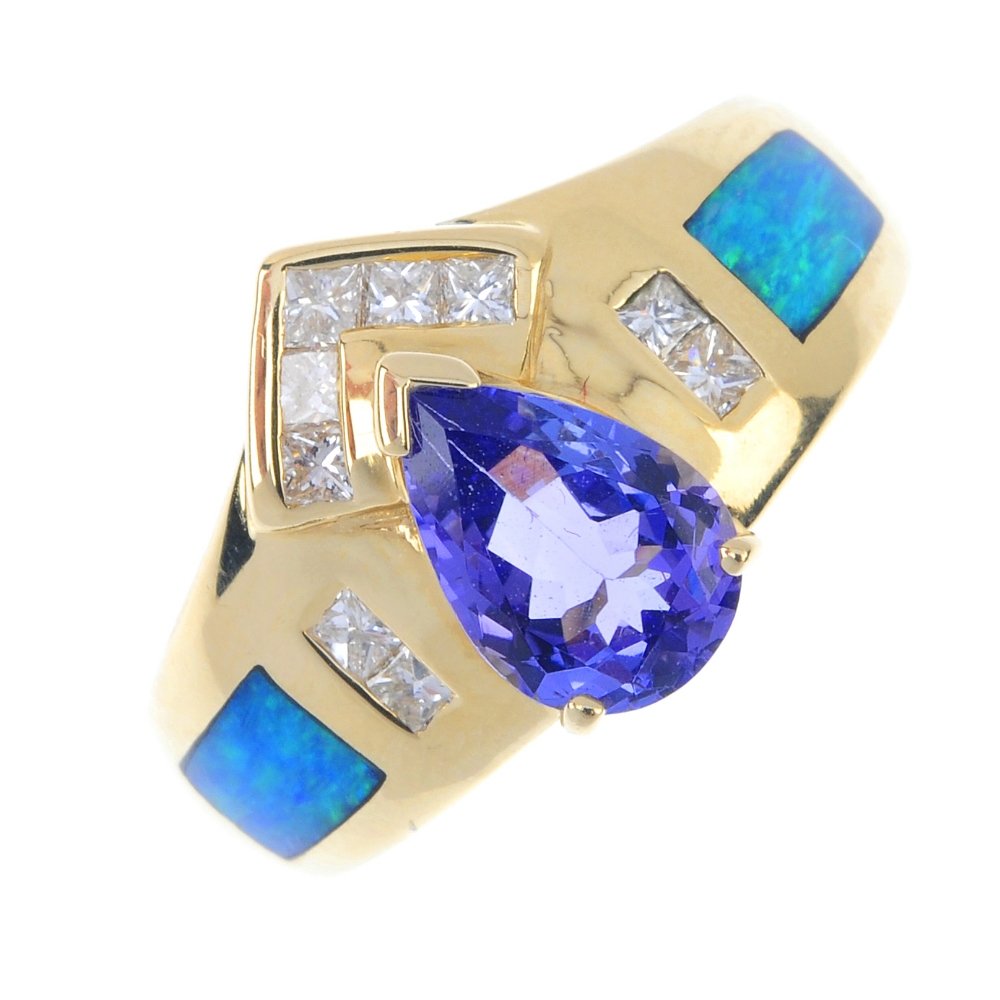 A tanzanite, opal doublet and diamond dress ring. Of (1 of 3)