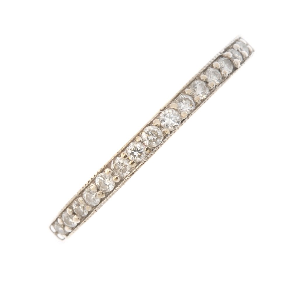 An 18ct gold diamond half-circle eternity ring. The (1 of 1)
