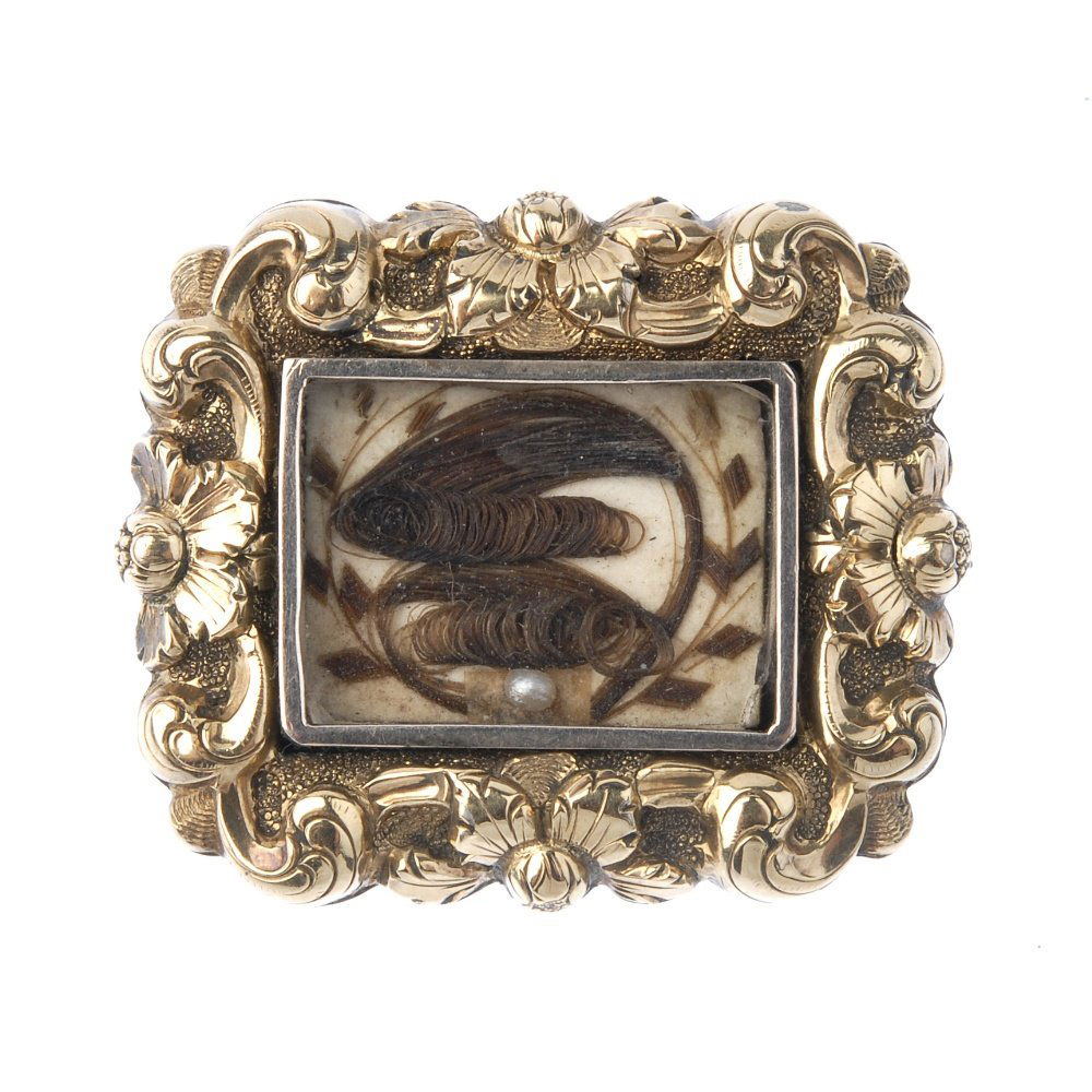 Two mid Victorian memorial brooches. The first with (1 of 3)