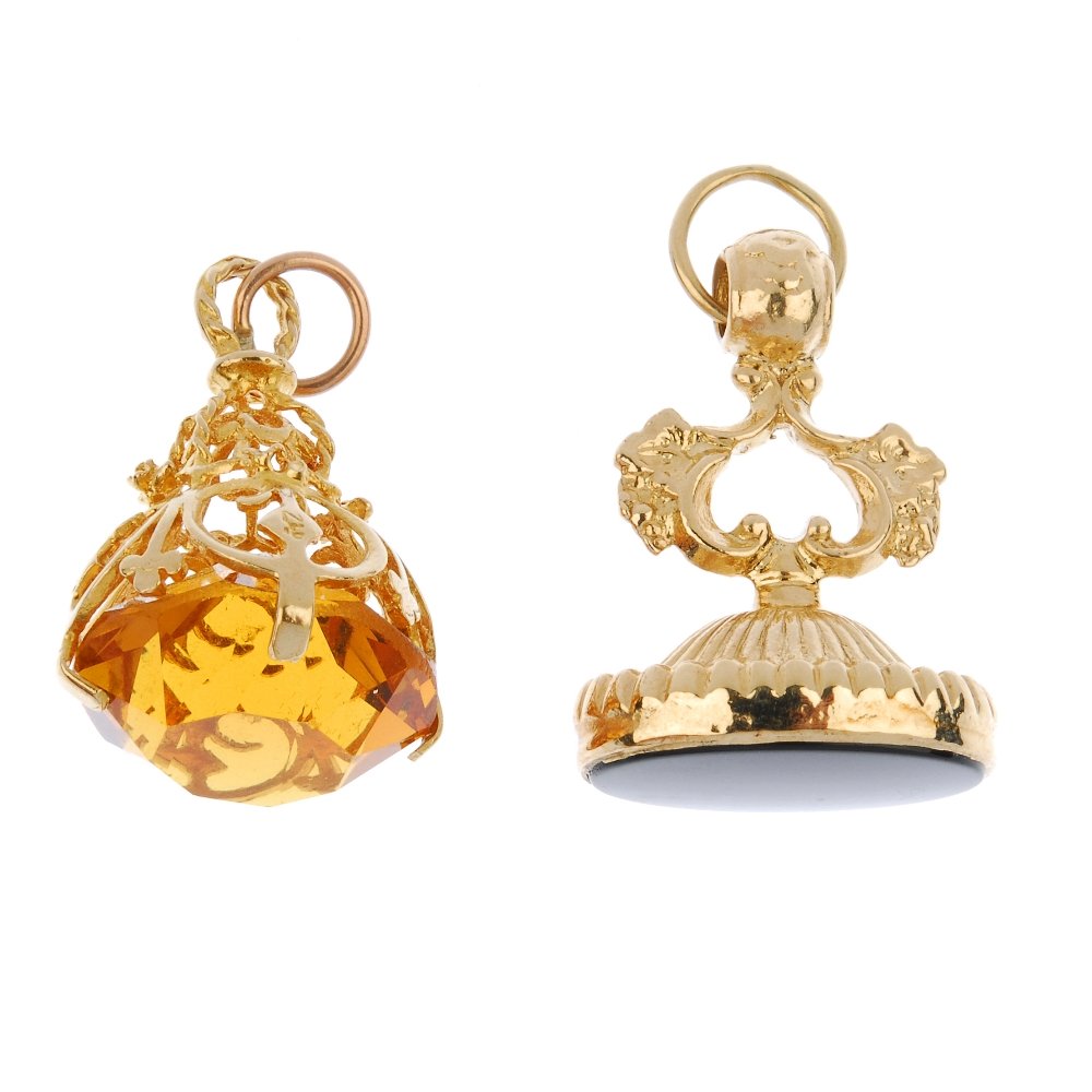 Two gem-set fobs. To include a 9ct gold orange paste (1 of 2)