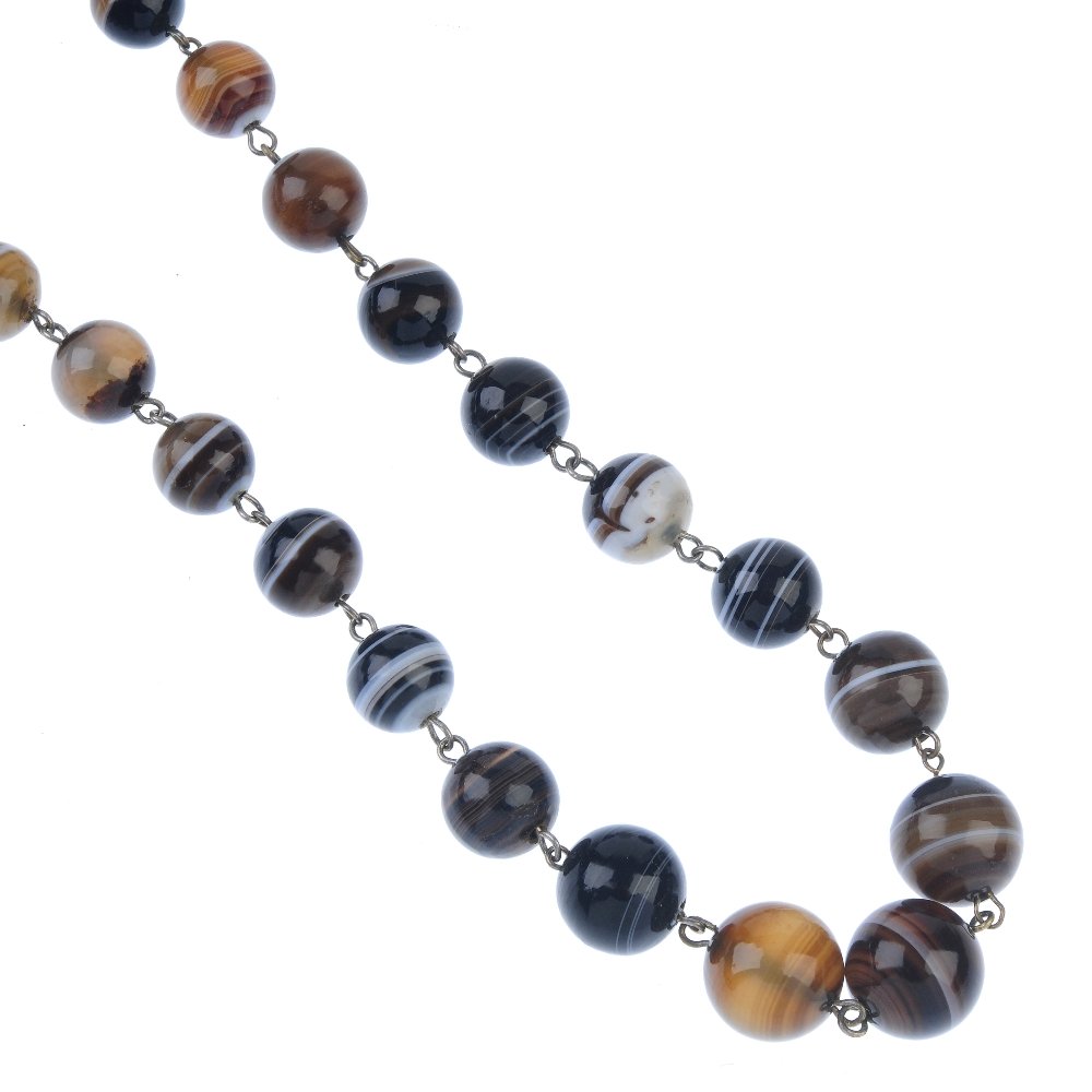 An agate necklace. Comprising twenty-five graduated (1 of 2)