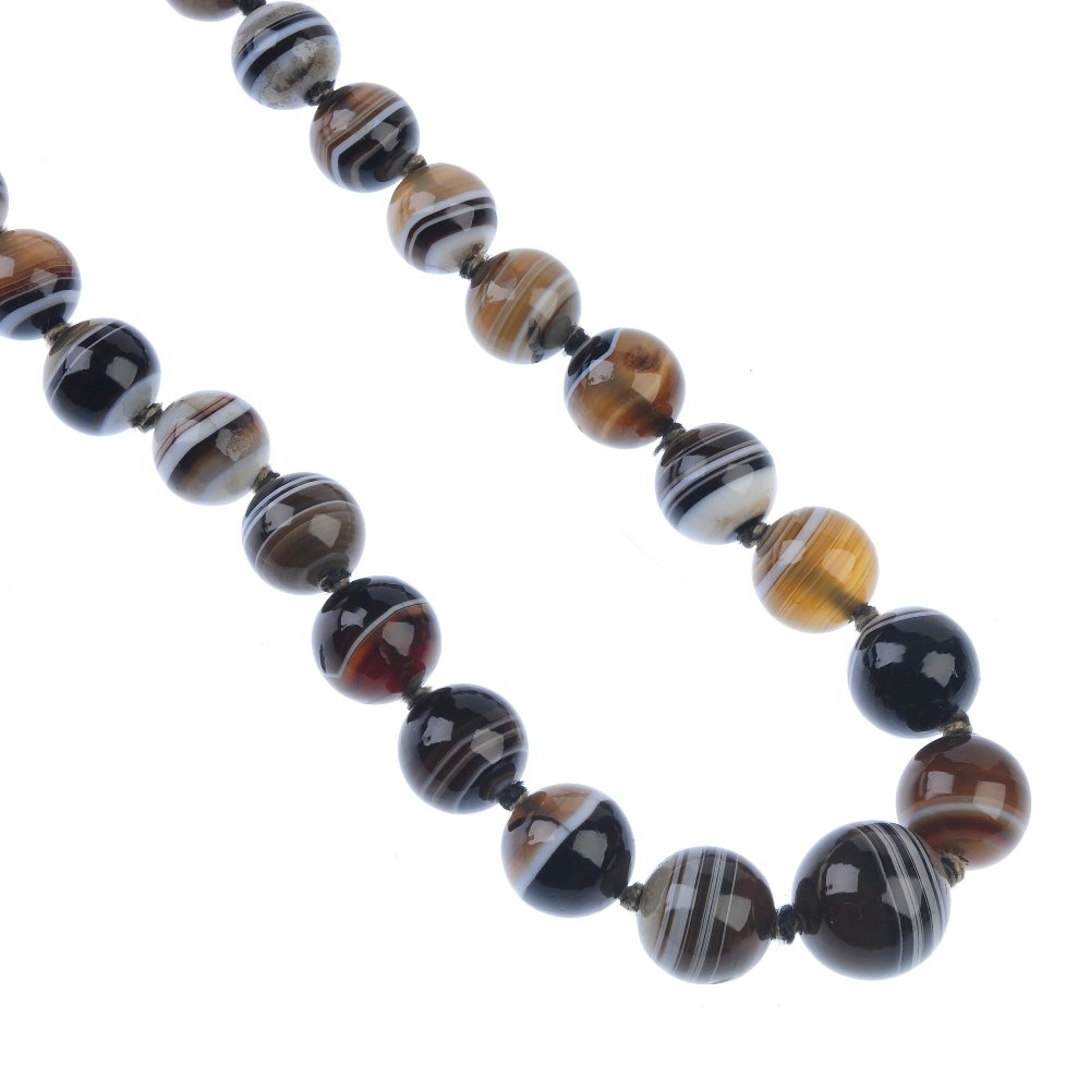 An agate bead necklace. Comprising a series of (1 of 2)