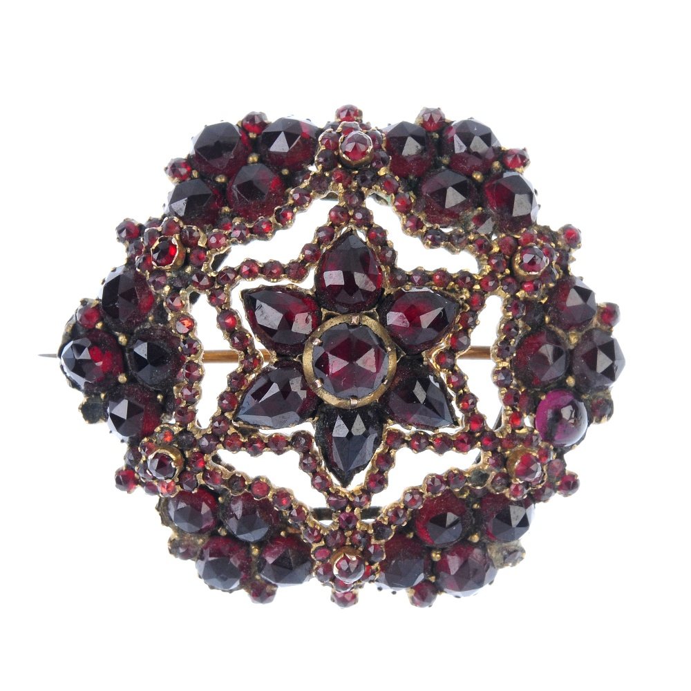A late 19th century garnet and paste brooch. The (1 of 2)