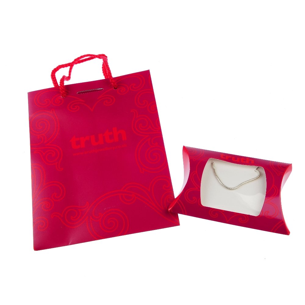 TRUTH - a selection of bracelets and a necklace. To: TRUTH - a selection of bracelets and a necklace. To include twelve snake-link charm bracelets and a necklace with circular clasps. All stamped 925. Lengths 46 and 19.5cms. In original maker's packagin