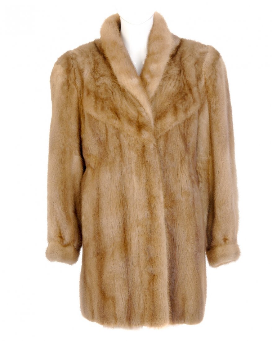 A three-quarter length pastel mink swing coat. Designed (1 of 2)