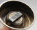 A 1930's silver tea strainer, hexagonal sided with twin - 6