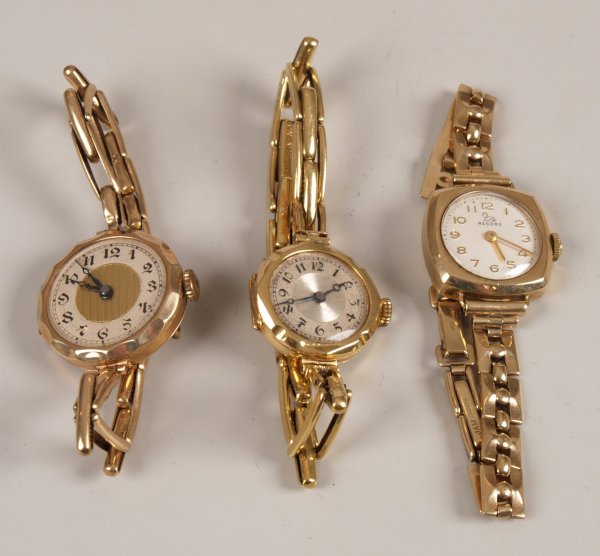 Three assorted 9ct gold ladies wrist watches all: Three assorted 9ct gold ladies wrist watches all on 9ct gold fancy link bracelets.