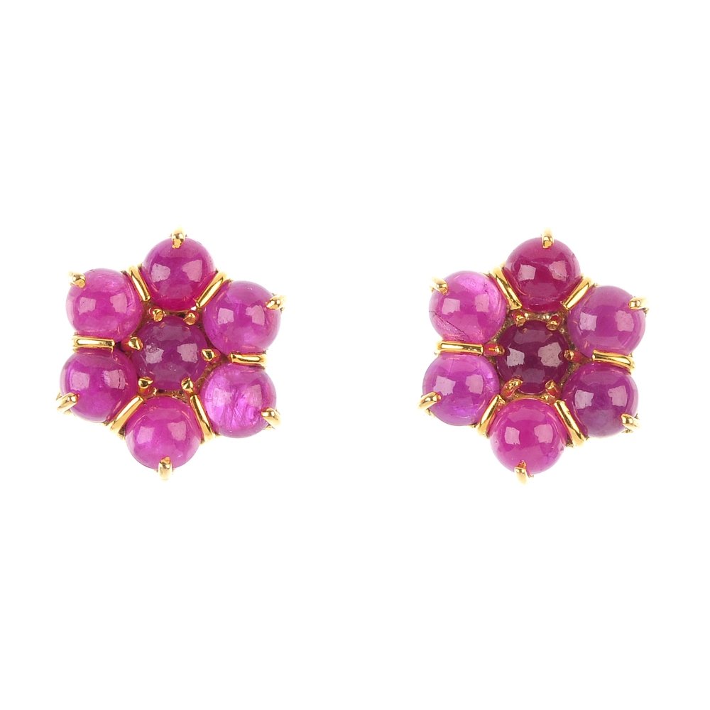 A pair of ruby ear studs. Each designed as a circular (1 of 2)
