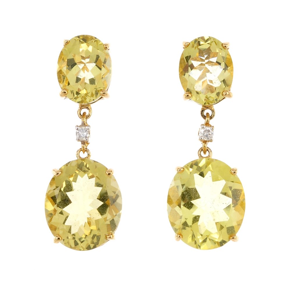 A pair of 9ct gold citrine and diamond ear pendants. (1 of 2)